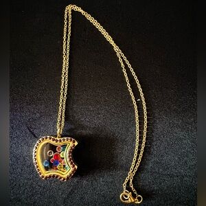 apple-shaped "living memory" floating charm locket necklace.
